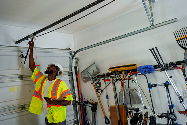 Professional Garage Door Panel Replacement technician working in Garden City, ID